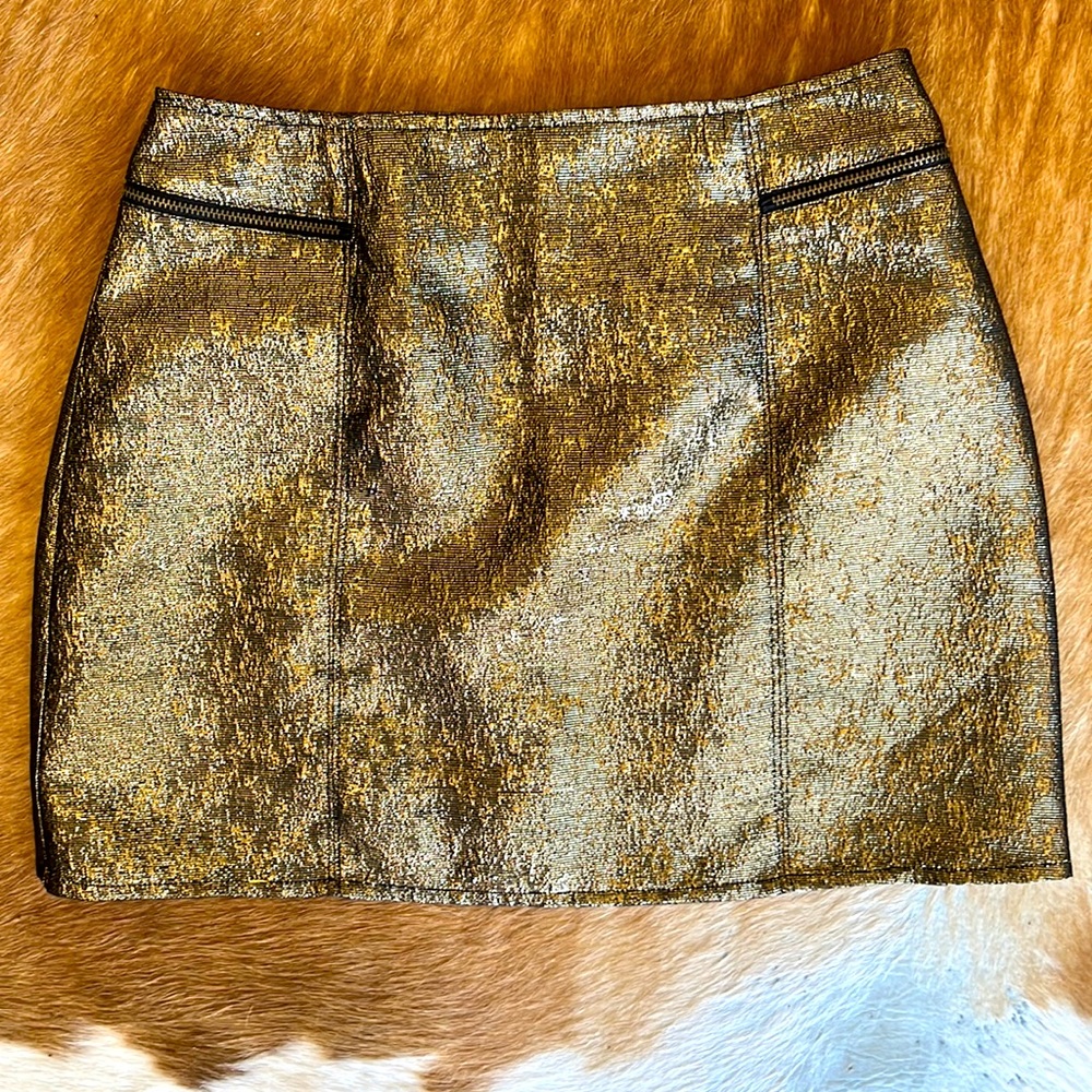 Free People gold shimmer mini skirt. Worn once. Let your disco/glam vibe shine!